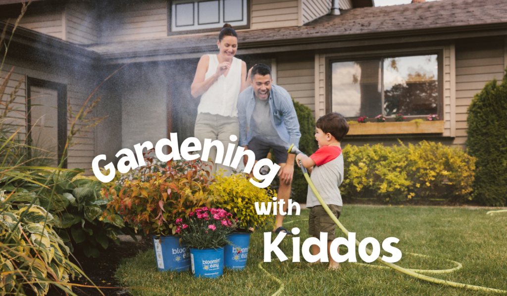 a young couple gardening with their kid