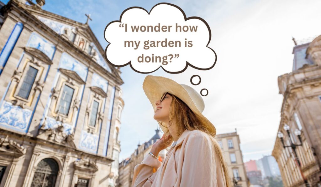 Woman in hat, thinking about her garden, city background.